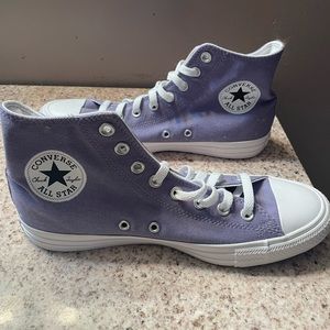 Brand new size 10 women in color purple.